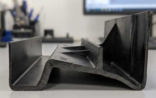 Injection Molded Component with Uneven Walls